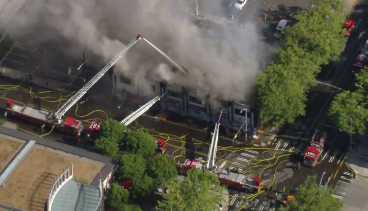 Crews battle 2-alarm fire in vacant building near Seattle Center